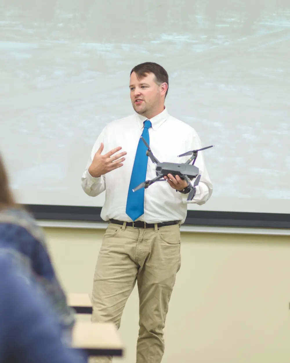 Professor with Event 38 drone for university education